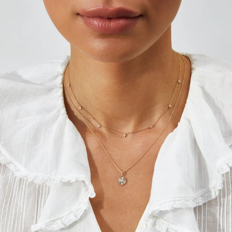 EF Collection 7 Diamond Sparkle Necklace in yellow gold on models neck.