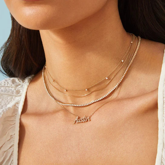 EF-Collection 7 Prong Set Diamond Necklace in yellow gold styled on models neck with diamond tennis necklace