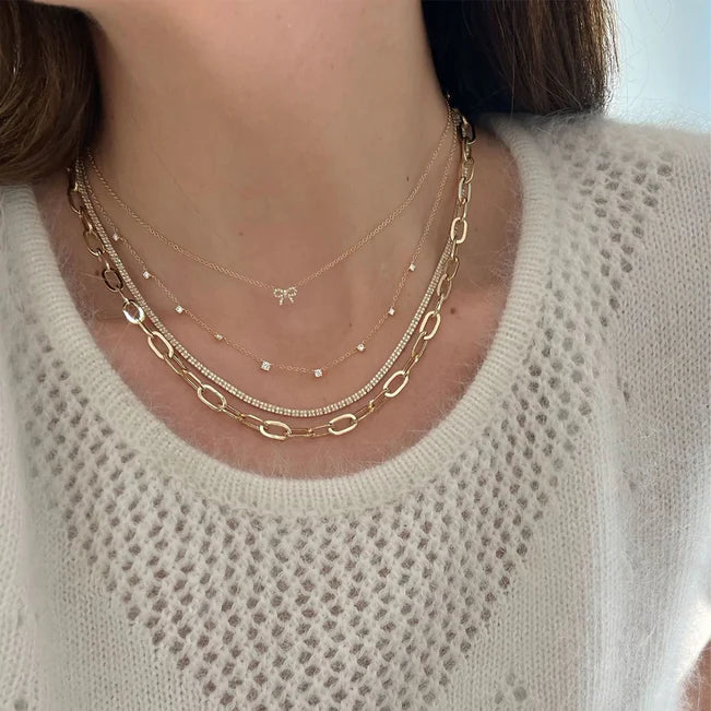 EF Collection 9 Prong Set Diamond Necklace in yellow gold styled with different diamond necklaces.