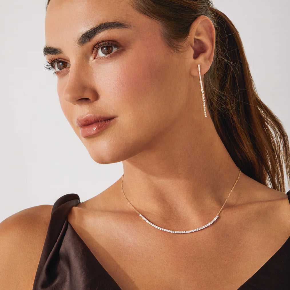 image of EF-Collection Diamond Row Necklace in yellow gold and diamonds on a model's neck.