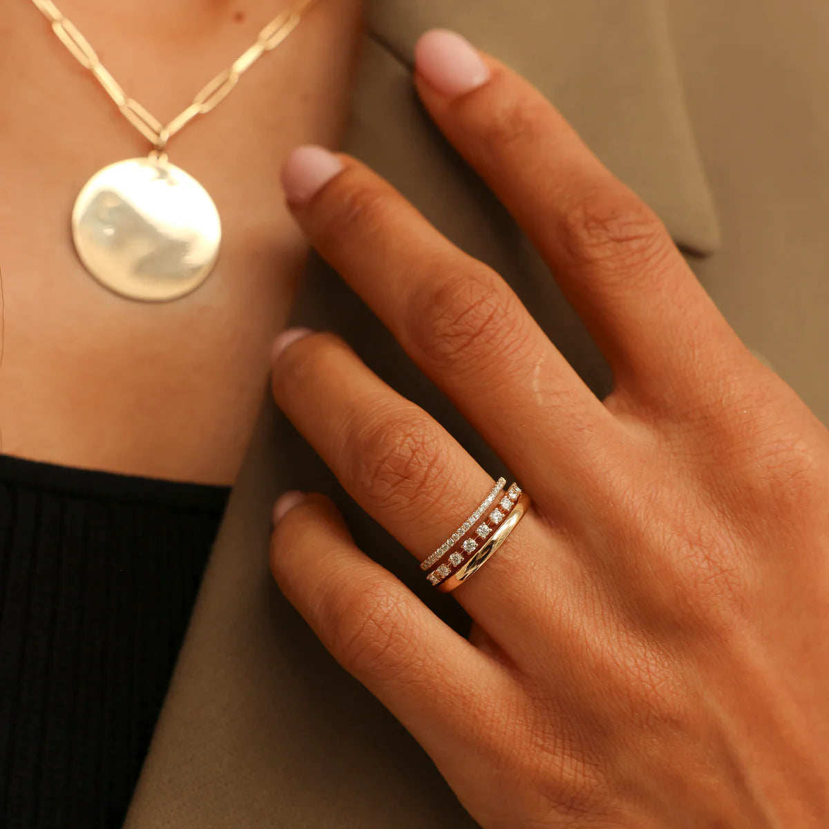 Dana Rebecca Designs Ava Bea Double Row Ring in yellow gold styled on models hand with wedding band and a gold necklace