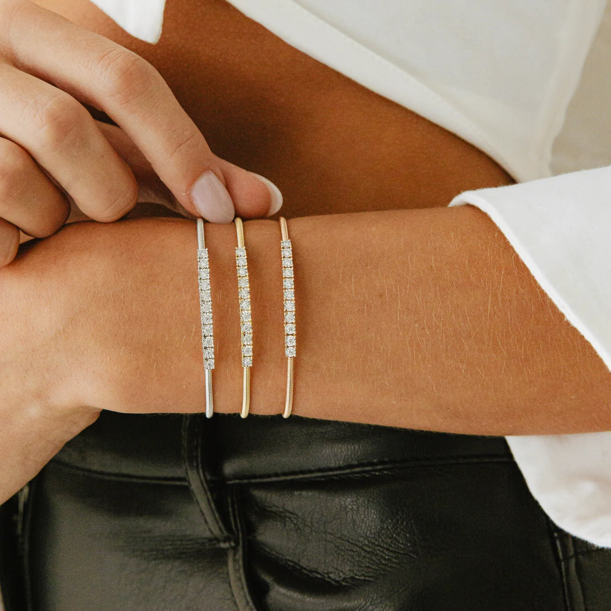 Dana Rebecca Designs Ava Bea Flexi Cuff Bracelet in yellow, white, and rose gold on models wrist