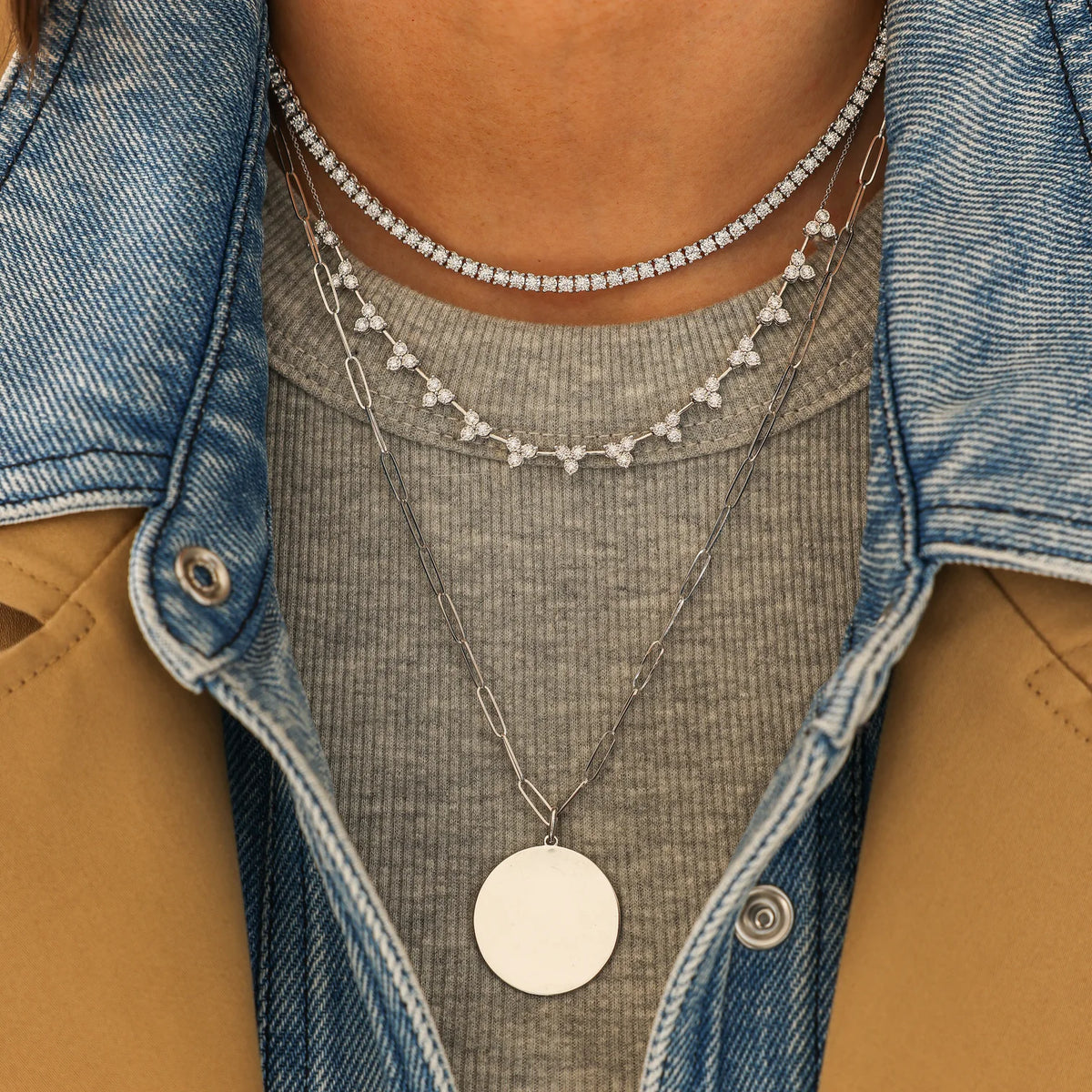Dana Rebecca Designs Ava Bea Interval Trio Tennis Necklace in white gold styled on models neck with ava bea tennis necklace