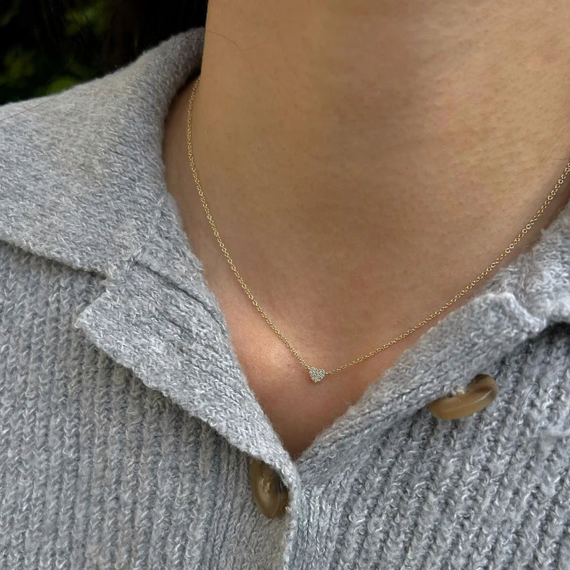 Single EF Collection Baby Diamond Heart Necklace in yellow gold on models neck.