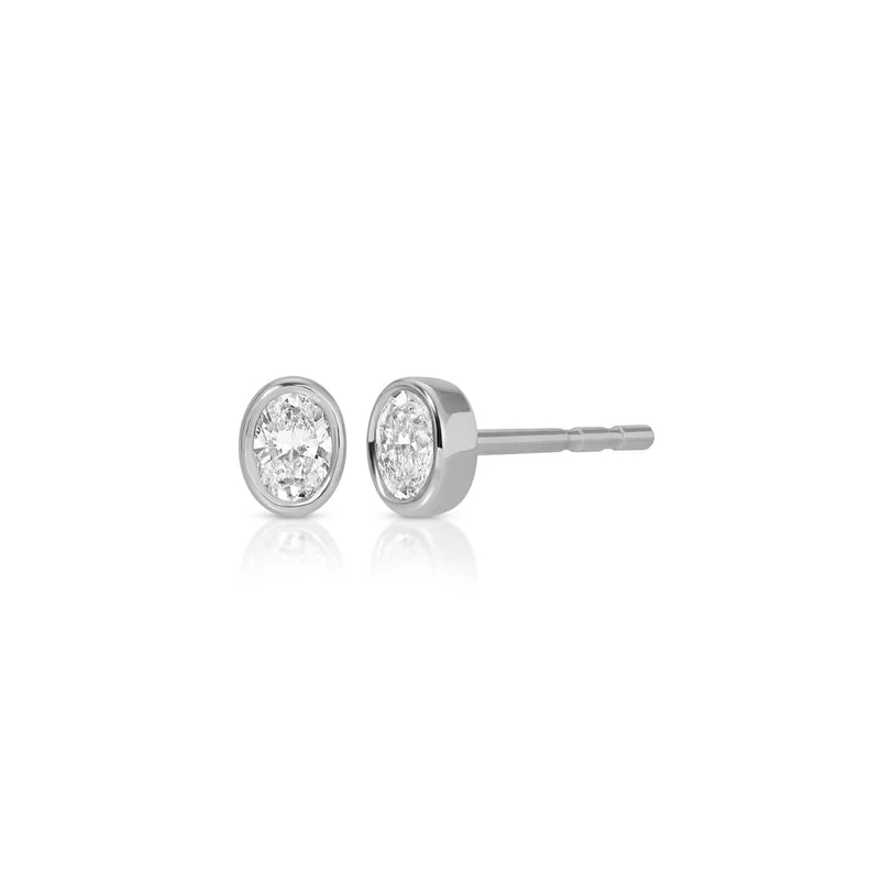 EF Collection Bezel Set Oval Diamond Stud Earrings in white gold displayed on white background.