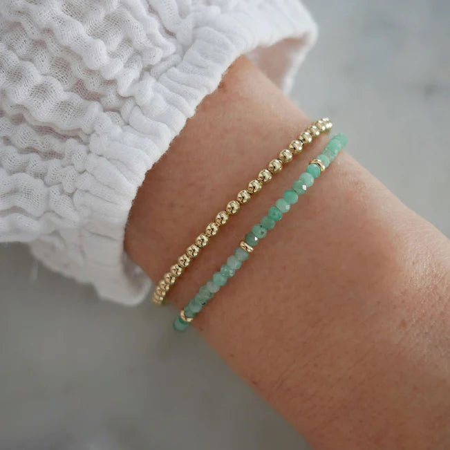 EF-Collection Birthstone Bead Bracelet In Emerald in yellow gold on white background with yellow gold bead bracelet