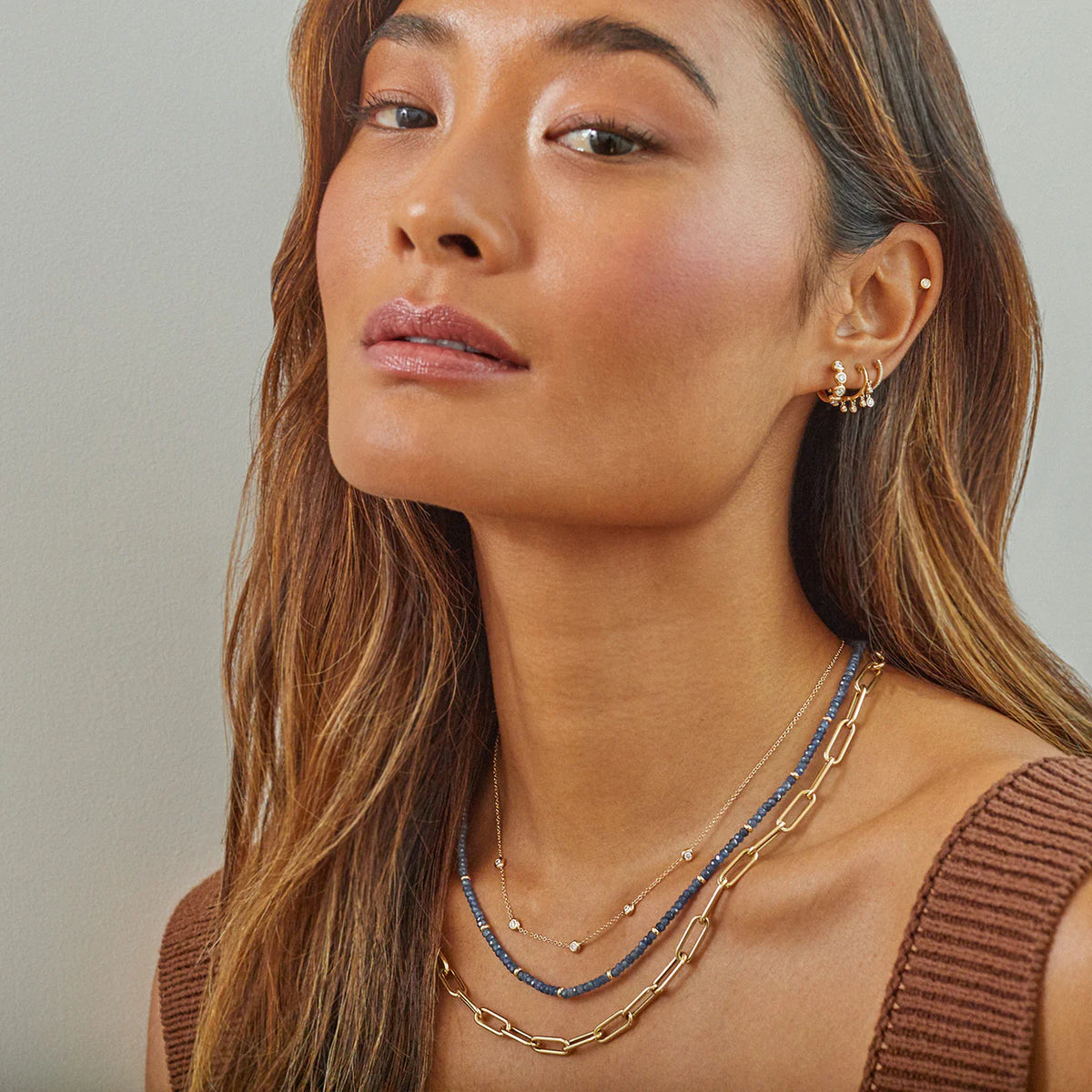 EF-Collection Birthstone Bead Necklace In Blue Sapphire in yellow gold on models neck with jumbo chain necklace