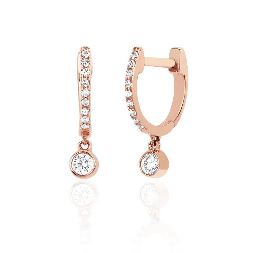 EF Collection Diamond Bezel Drop Mini Huggie Earring in rose gold on white background.