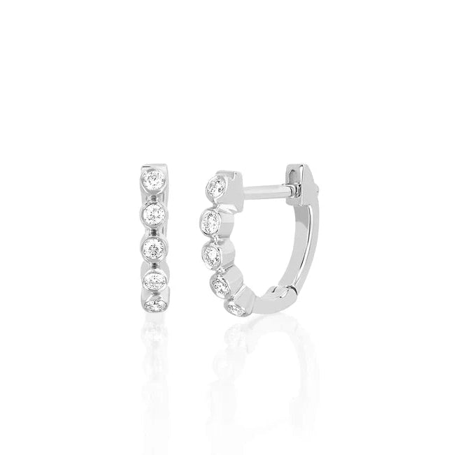EF Collection Diamond Bezel Mini Huggie Earring in white gold on white background.