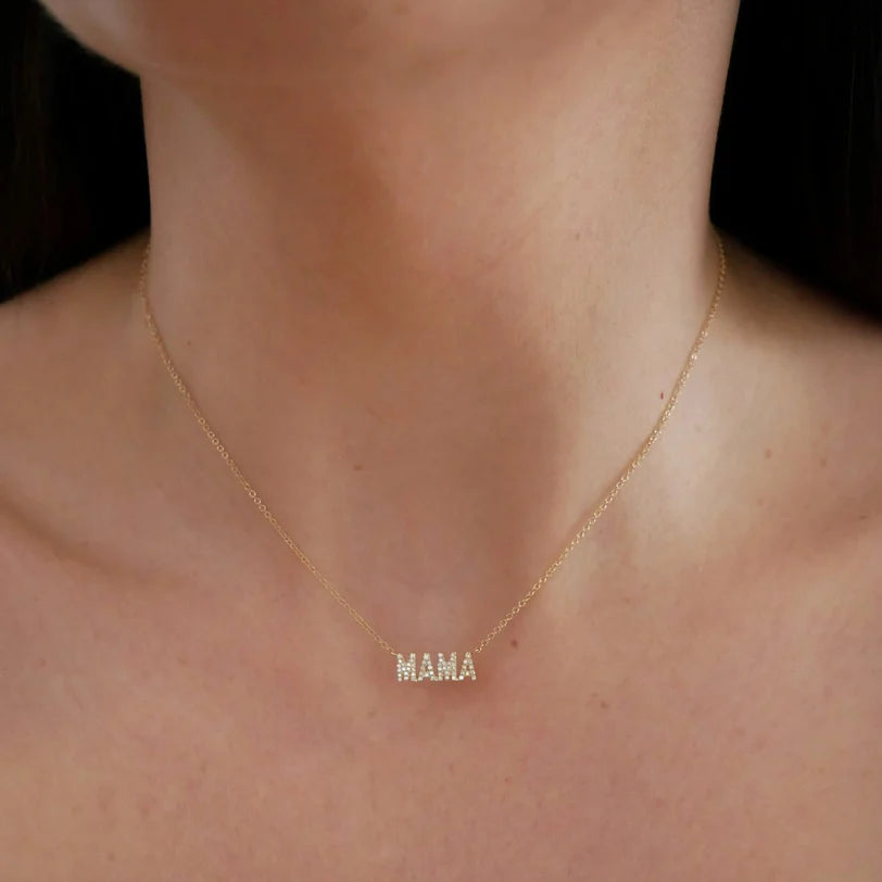 Close up of EF Collection Diamond Block Mama Necklace in yellow gold styled on models neck