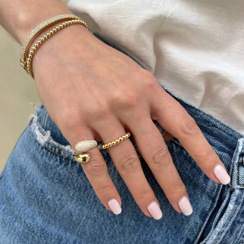 EF Collection Diamond Dome Ring in yellow gold on model’s pinky finger as a signet ring.