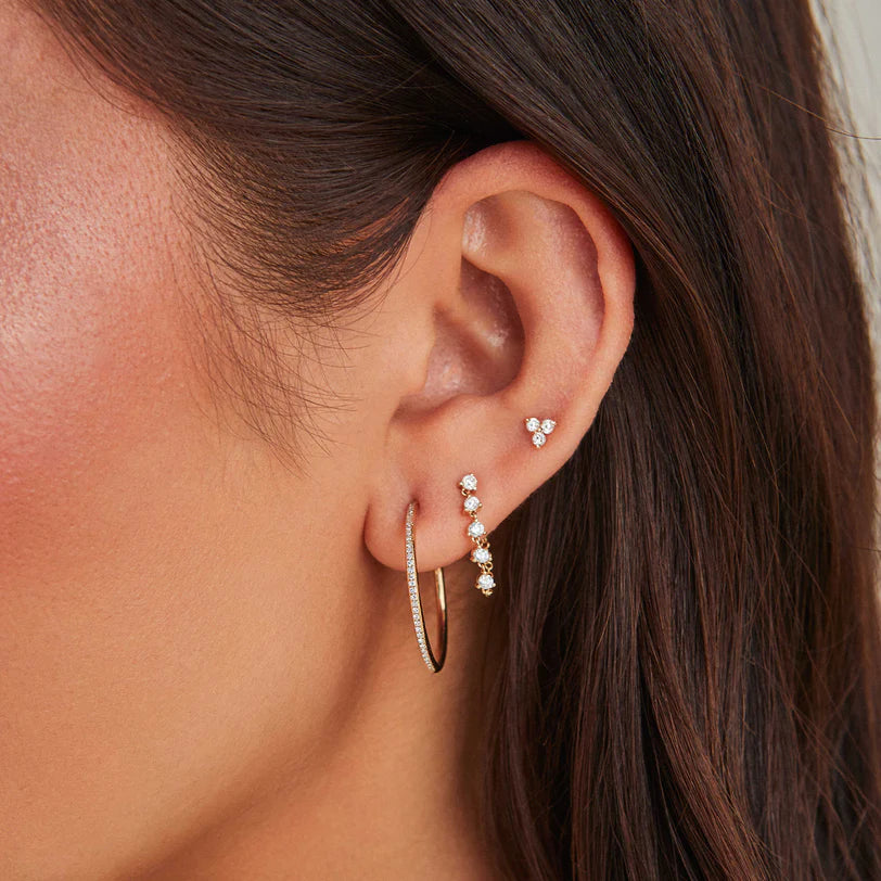 EF Collection Diamond Essential Hoop Earrings in yellow gold styled on models ear.