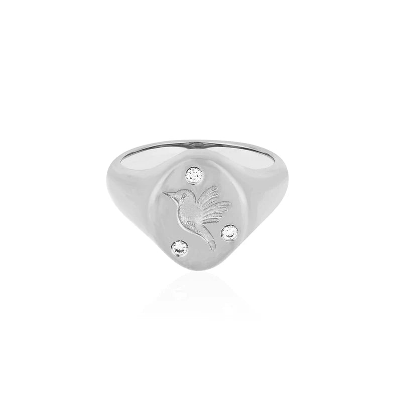 EF Collection Diamond Hummingbird Signet Ring in white gold on white background.