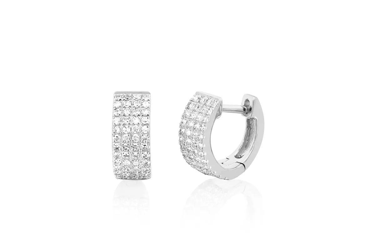 EF-Collection Diamond Jumbo Huggie Earrings in white gold on white background.