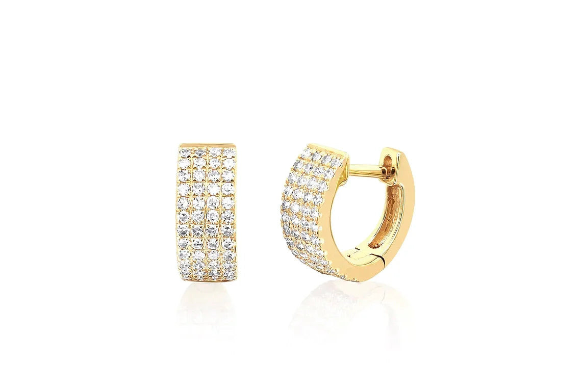 EF-Collection Diamond Jumbo Huggie Earrings in yellow gold on white background.