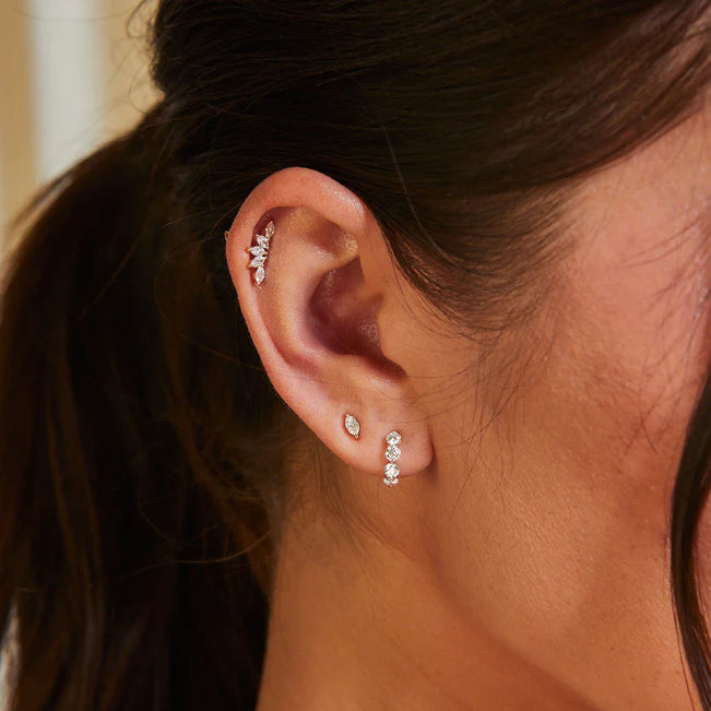 EF Collection Diamond Marquise Stud Earring in white gold styled on models ear .