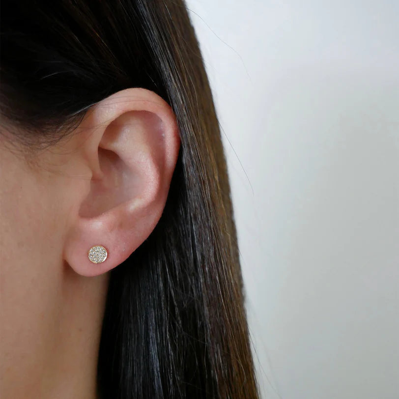 EF Collection Diamond Mini Disc Stud Earrings in yellow gold styled on models ear.
