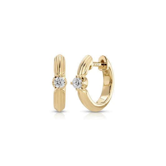 EF-Collection Diamond Zoe Huggie Earrings in yellow gold on a white background