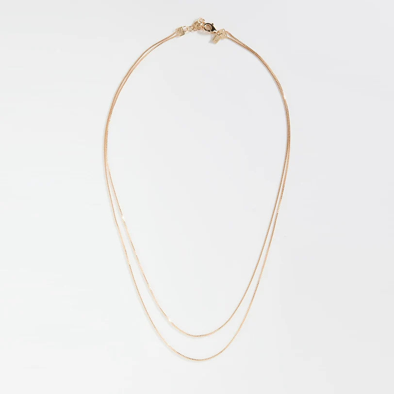 Full shot of EF-Collection Double Strand Liquid Gold Necklace in yellow gold on white background