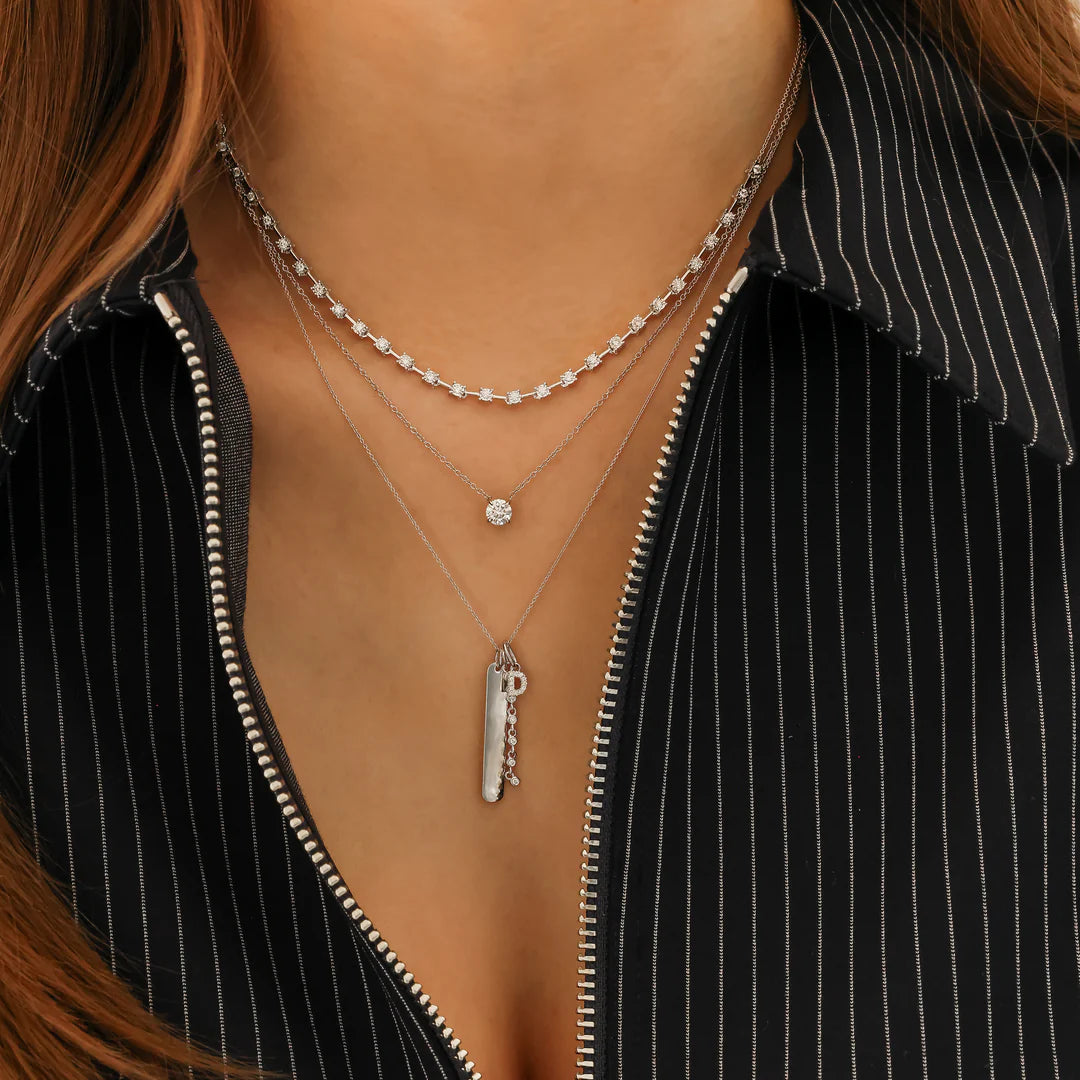 Dana Rebecca Designs DRD Diamond Initial Charm in white gold styled on models neck