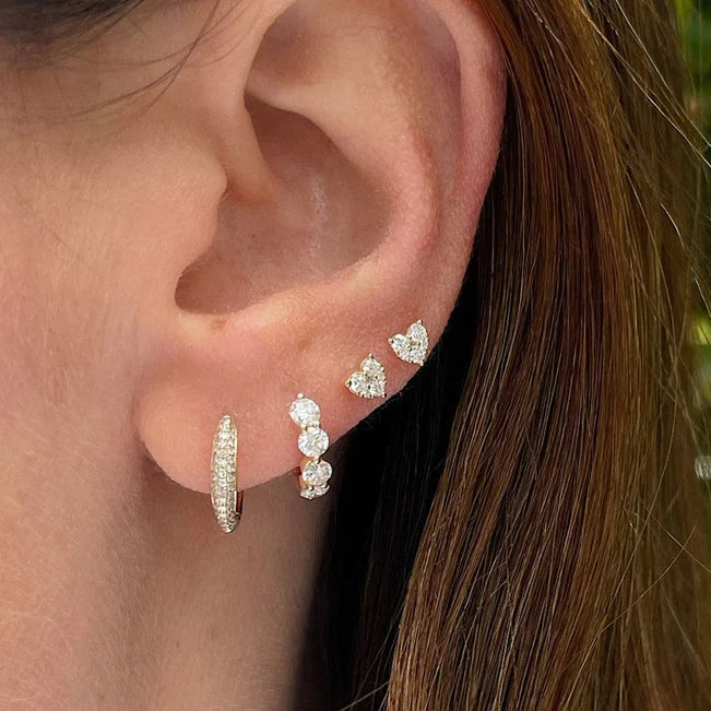 EF Collection Full Cut Diamond Mini Heart Stud Earring in yellow gold on models ear.