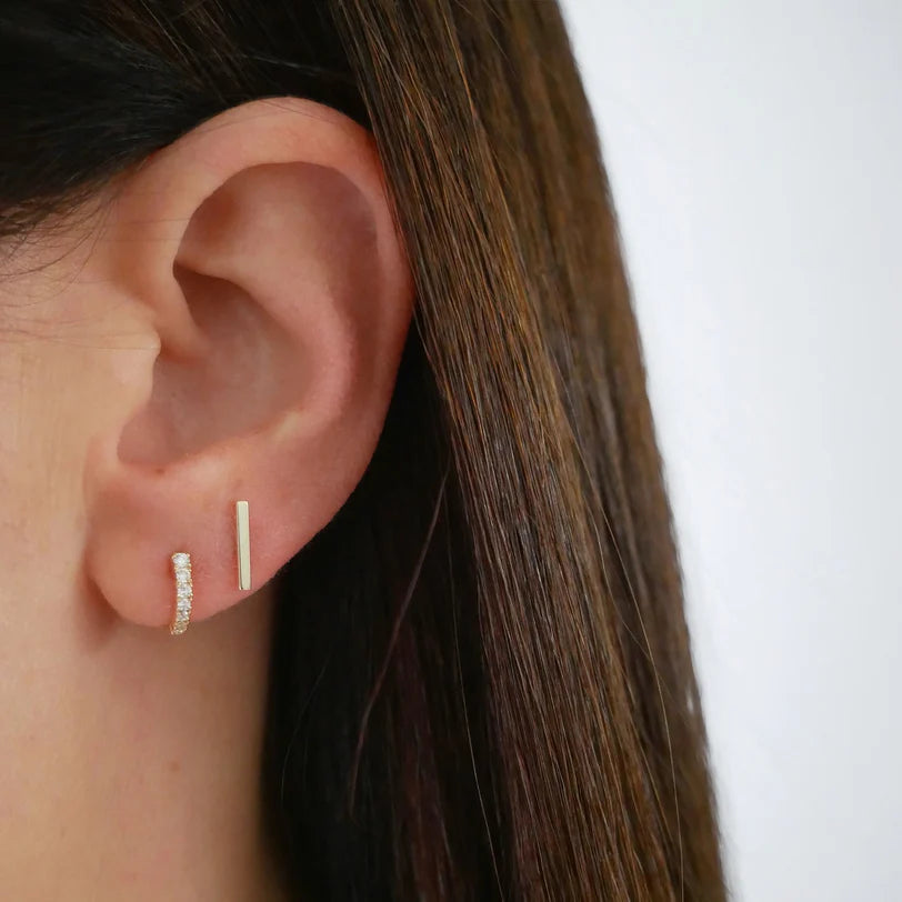 EF Collection Gold Bar Stud Earring in yellow gold styled on models ear