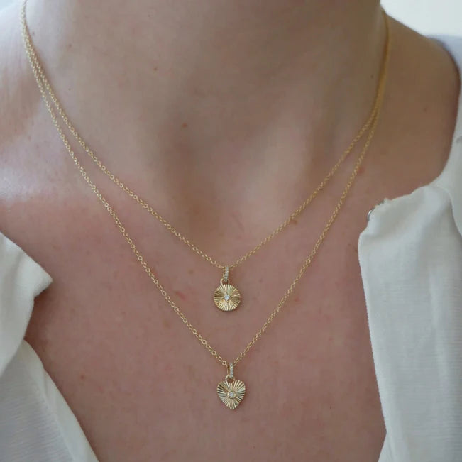 EF Collection Gold & Diamond Fluted Disc Necklace in yellow gold styled on models neck with heart disc necklace.