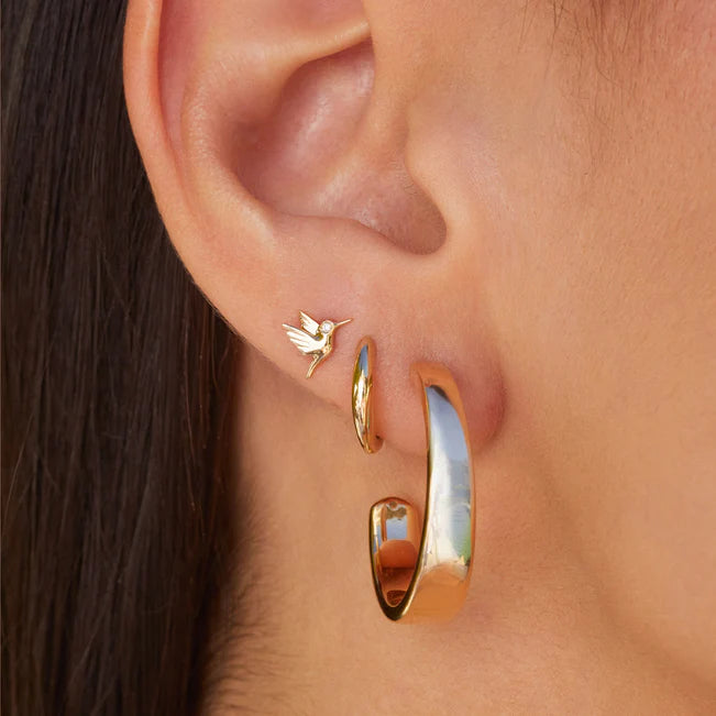 EF Collection Gold Dome Huggie Earring in yellow gold styled on models ear.