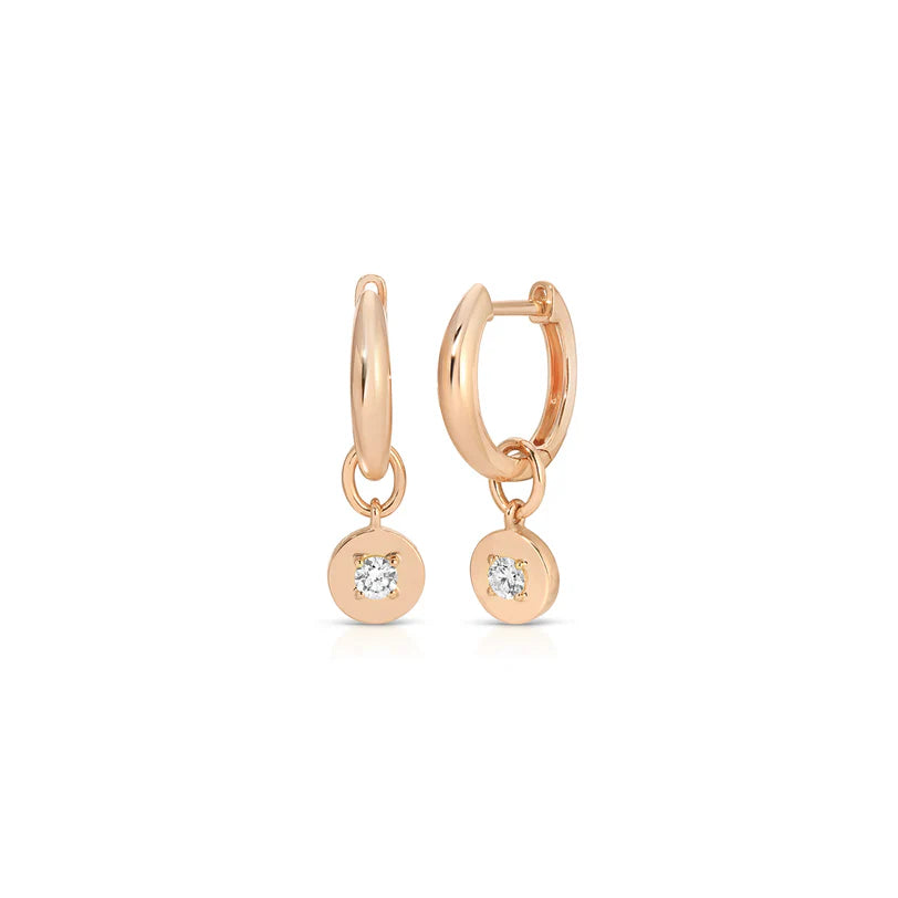 EF Collection Gold Frame Round Diamond Huggie Charm On Gold Dome Huggie Earring in rose gold displayed on white background.