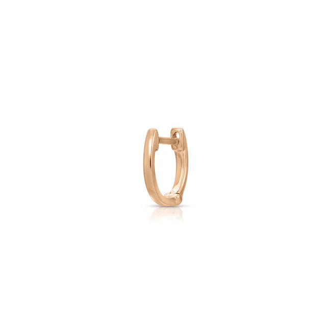 Single EF Collection Gold Mini Huggie Earring in rose gold on white background.