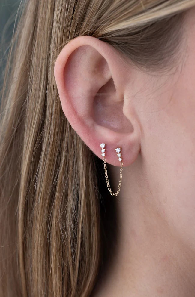 Ef collection Graduated Diamond Double Chain Stud Earring styled in white gold on models ear.