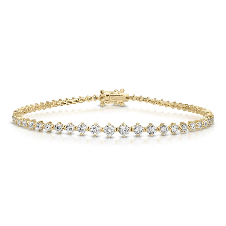 EF Collection Graduated Diamond Eternity Bracelet in yellow gold on white background.