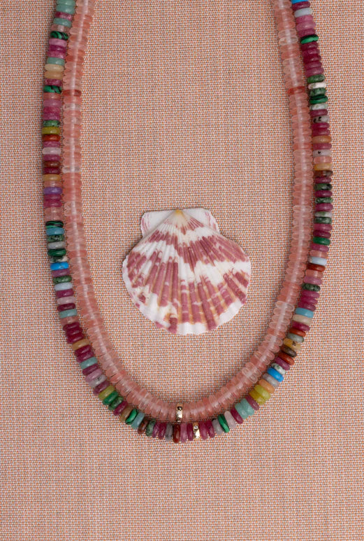 EF Collection Party Mix Rondelle Bead Necklace on pink background with seashell.