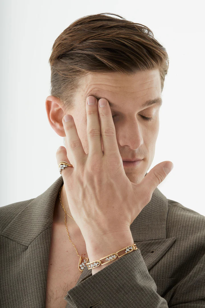 Rosario Navia Mara Folded Link Bracelet III in yellow gold on mens wrist