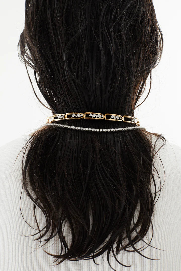 Rosario Navia Mara Folded Link Choker III in yellow gold styled on models hair