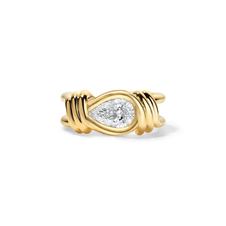 Rosario Navia Twist Link Pear Diamond Ring in yellow gold on white background