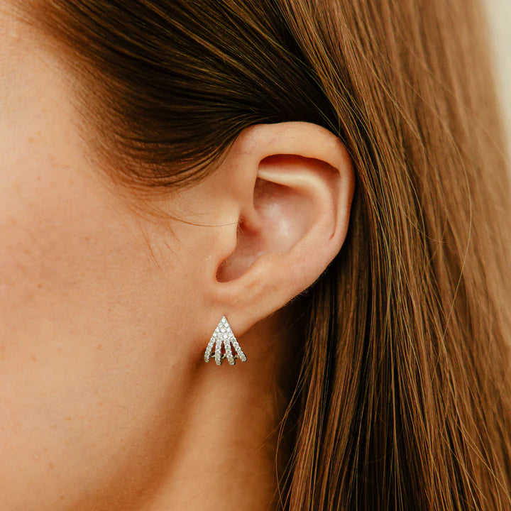 Single Dana Rebecca Designs Sarah Leah Four Burst Huggies in white gold styled on models ear