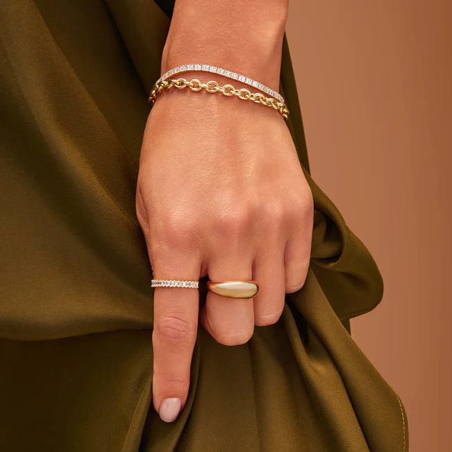 EF-Collection Sienna Chain Bracelet styled on models wrist with a tennis bracelet and two styles of rings