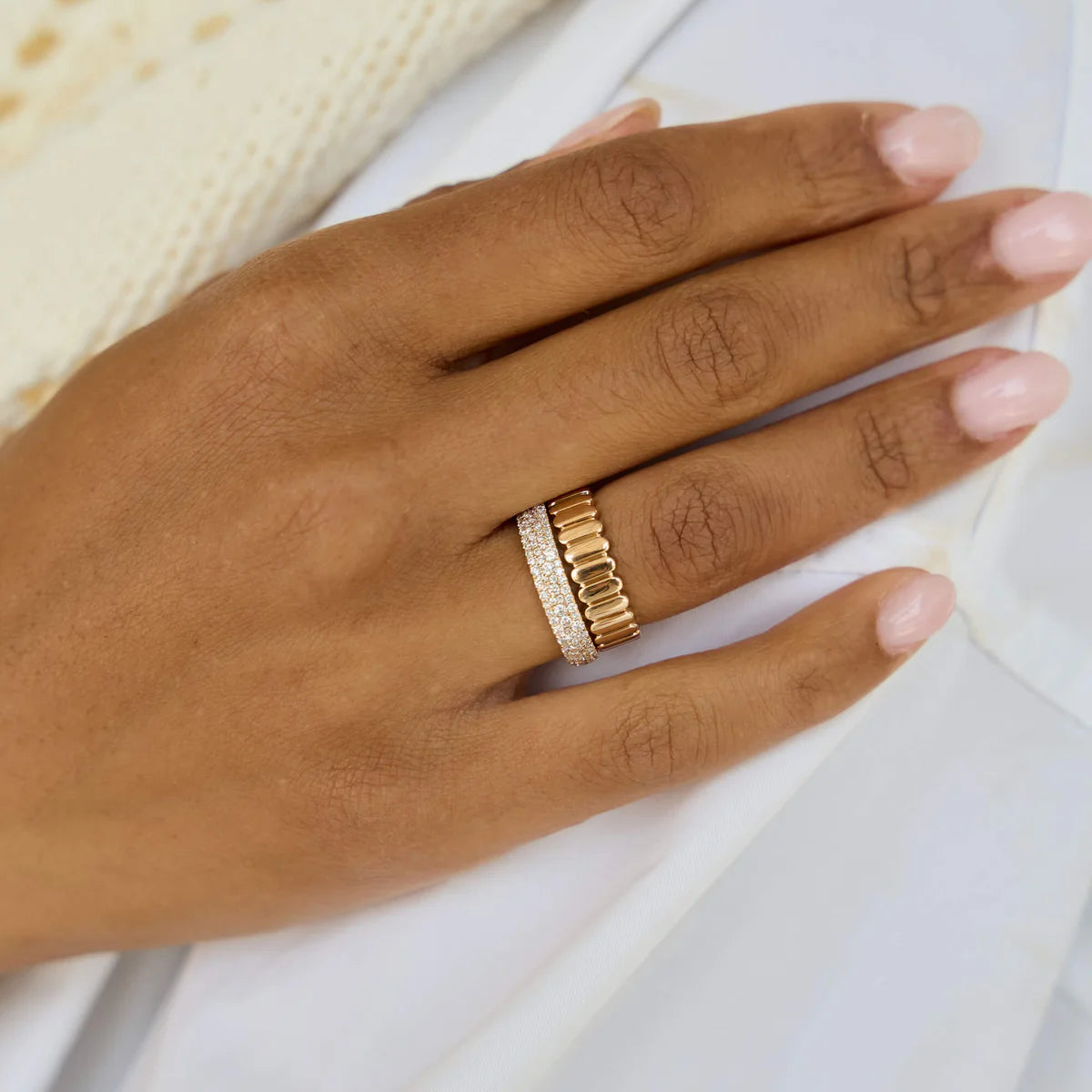 Dana Rebecca Designs Sylvie Rose Large Pavé Ring styled on models hand in yellow gold with a gold statement ring