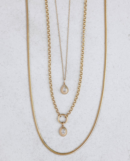 Product shot Ef Collection Snake chain necklace in yellow gold on a white background.