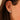 close up of Ava Bea X Studs in White Gold stacked on model's ear