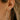 close up of DRD Large diamond hoops stacked in an ear