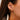close up of model wearing drd Sylvie rose bar studs on stacked with hoops on her ear