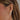 The Diamond Maeve Hoop Earrings add a touch of edge to any look. Crafted in a bold teardrop shape with pave diamonds, we reimagined the classic hoop in a new silhouette designed to reflect light and shine from every angle.