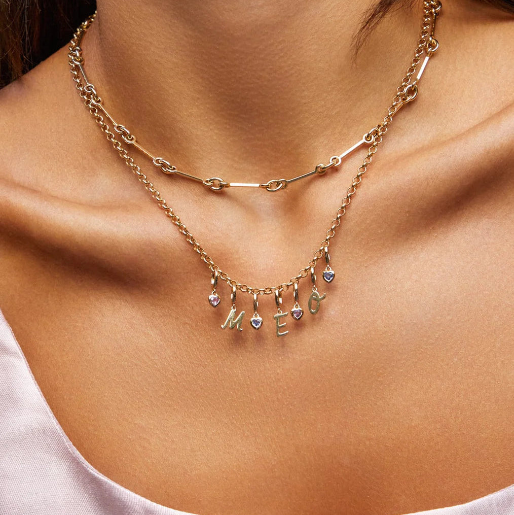 image of EF-Collection Mini Pink Sapphire Heart Clip Charm in rose gold in a chain on a model's neck. 