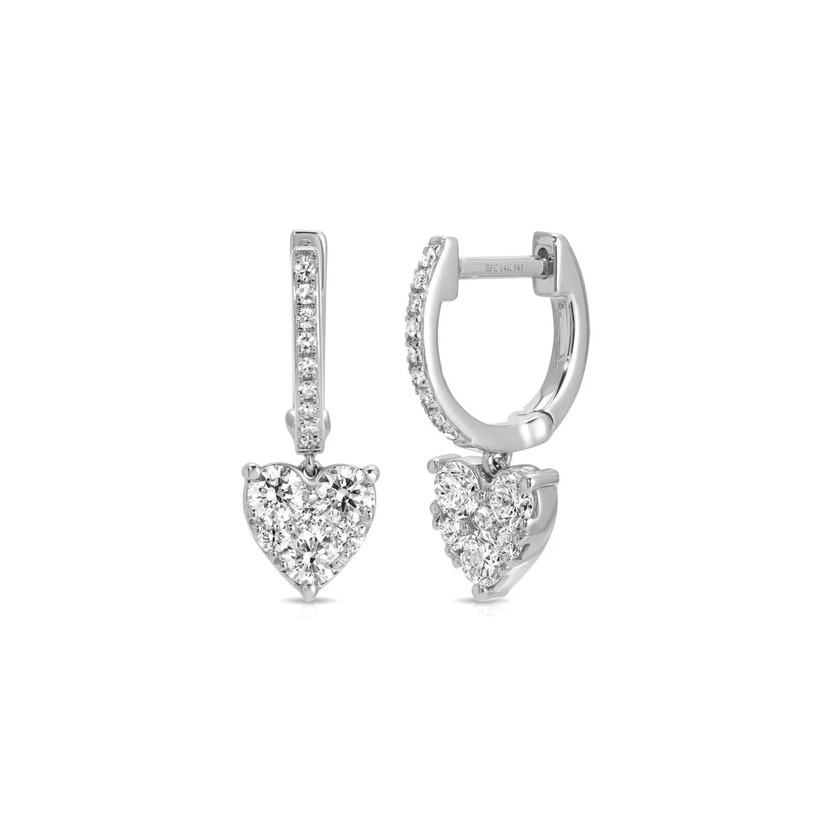 Product image of EF-Collection diamond heart mini huggie earrings in white gold and diamond on a white background. 