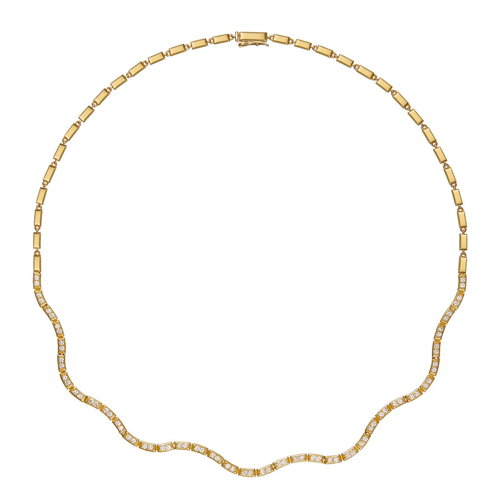 Product shot of Onirikka Glimmer Wave tennis Necklace in yellow gold on white background