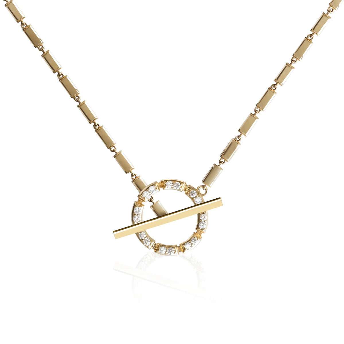 Product Shot of Onirikka's Glimmer Toggle Necklace in yellow gold and diamonds on a white background