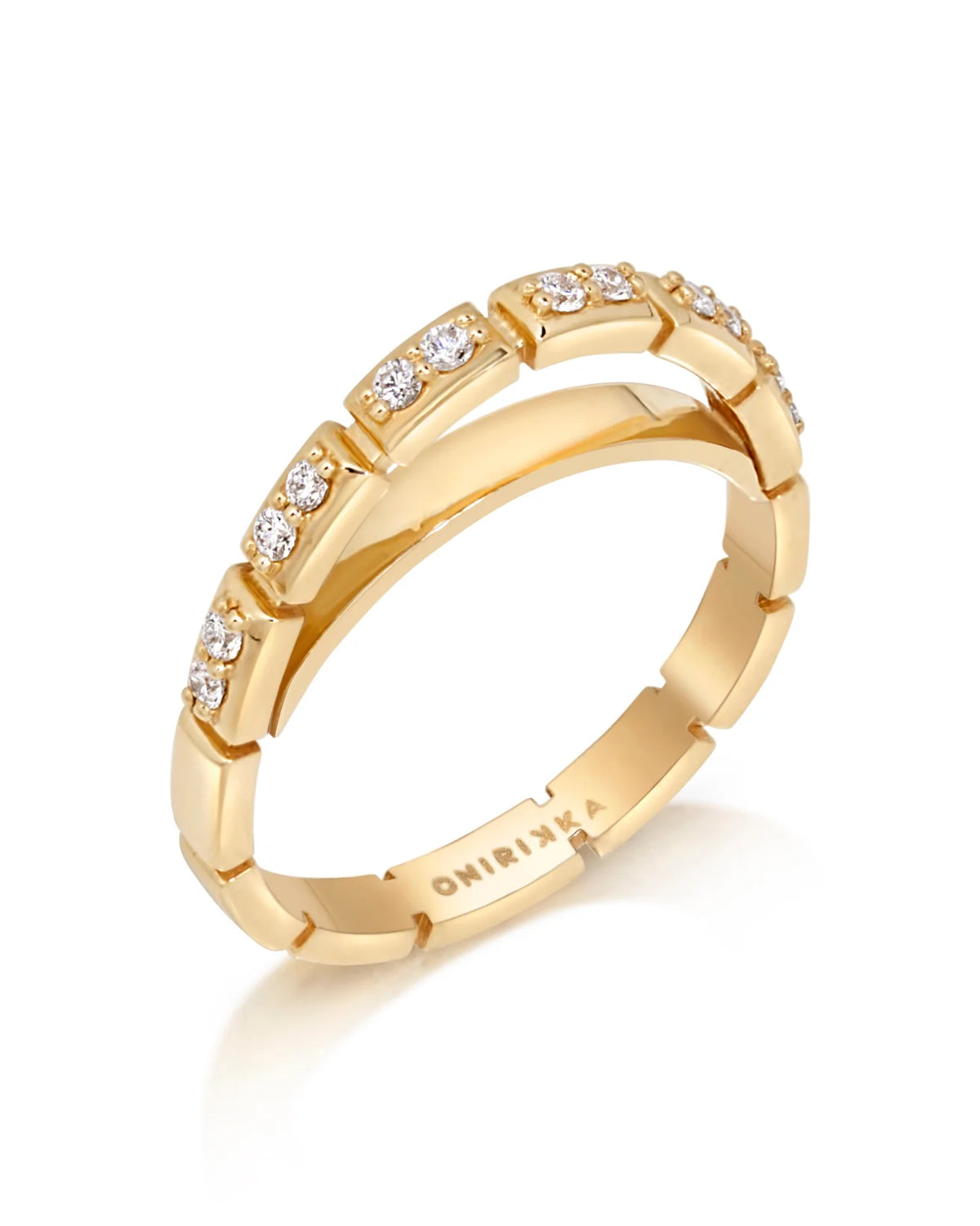 Product shot of Onirikka Oval Diamond band ring in 18k yellow gold and diamonds on a white background 