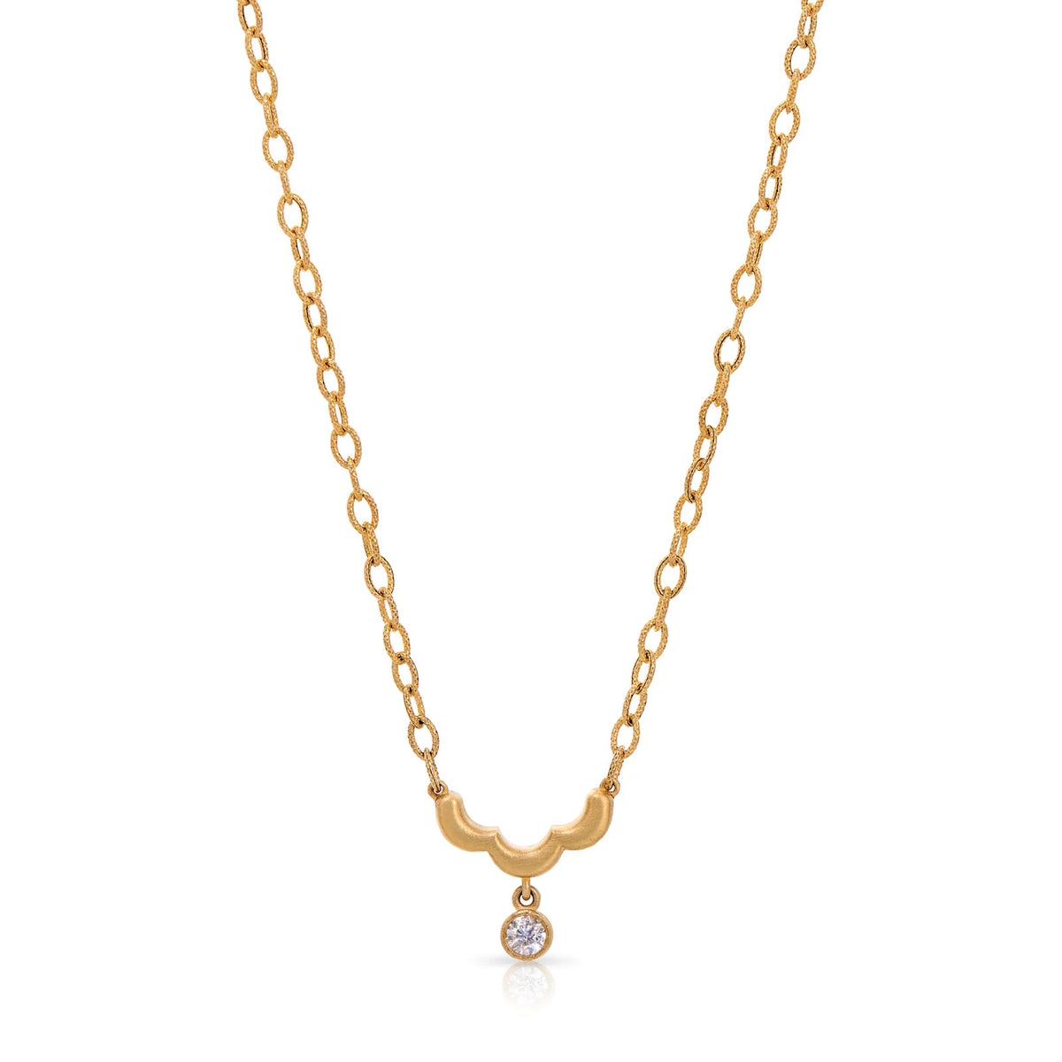 Product shot of Onirikka Petite Single Floret Necklace in satin 14k yellow gold with a diamond drop pendant on a 16-inch rolo chain.